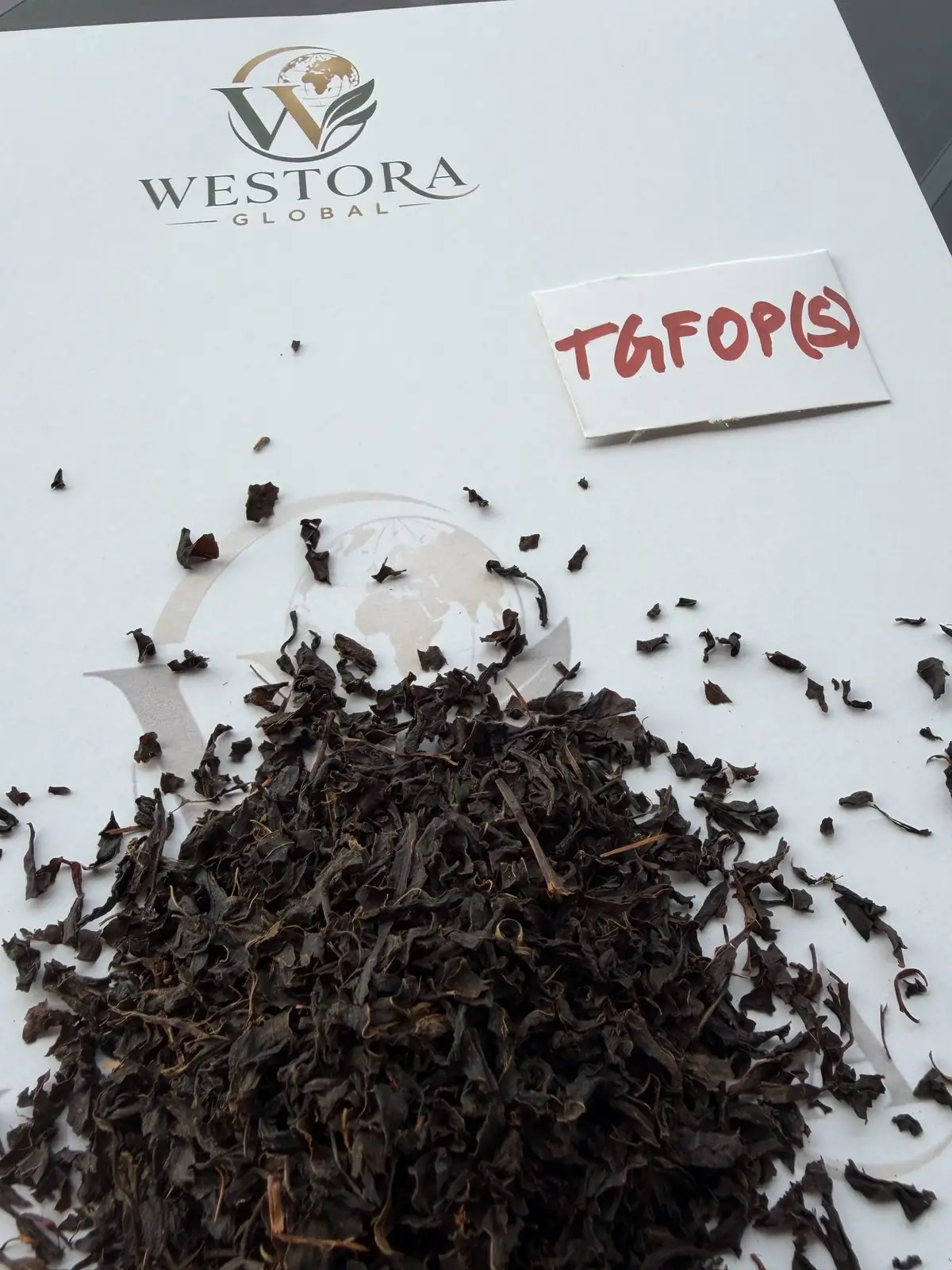 Close-up of Assam TGFOP(S) orthodox black tea leaf showing wiry twisted leaf